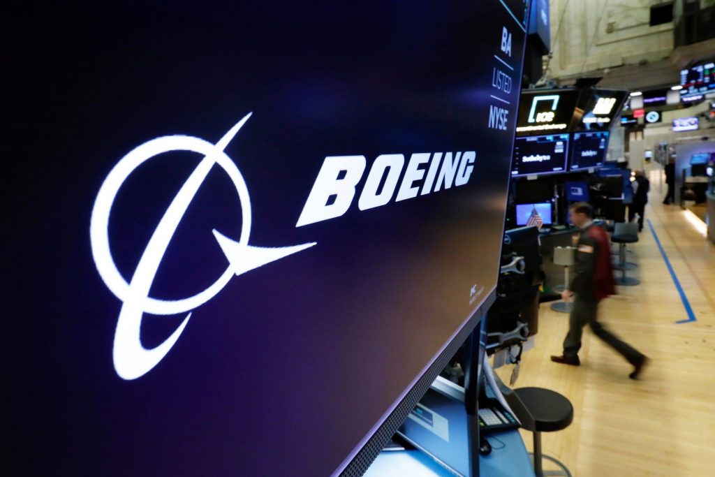 Boeing reduced quarterly loss by 12